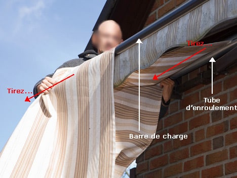 manière de tirer la toile pour un rentoilage du store banne